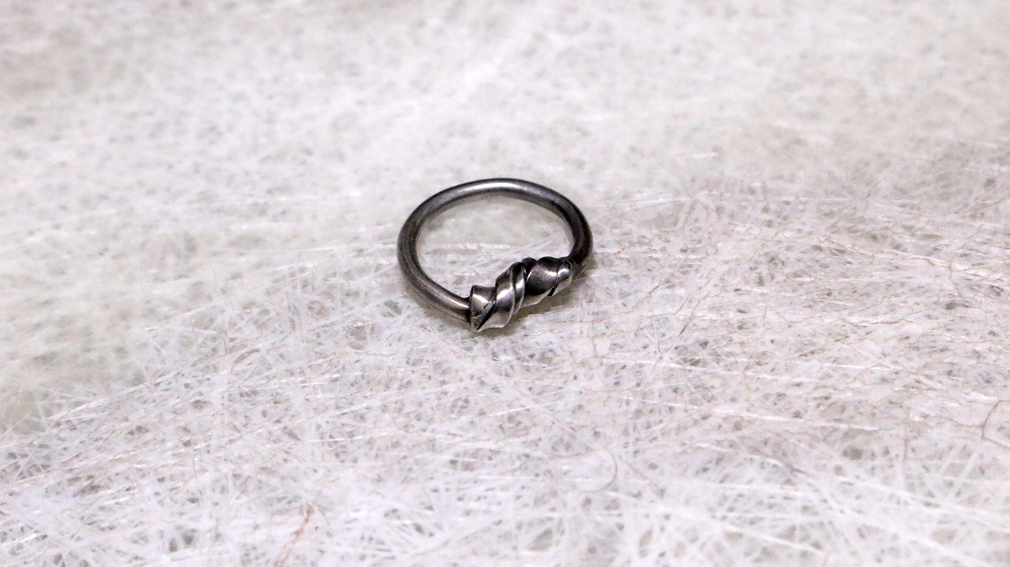 Deformed Coil Ring
