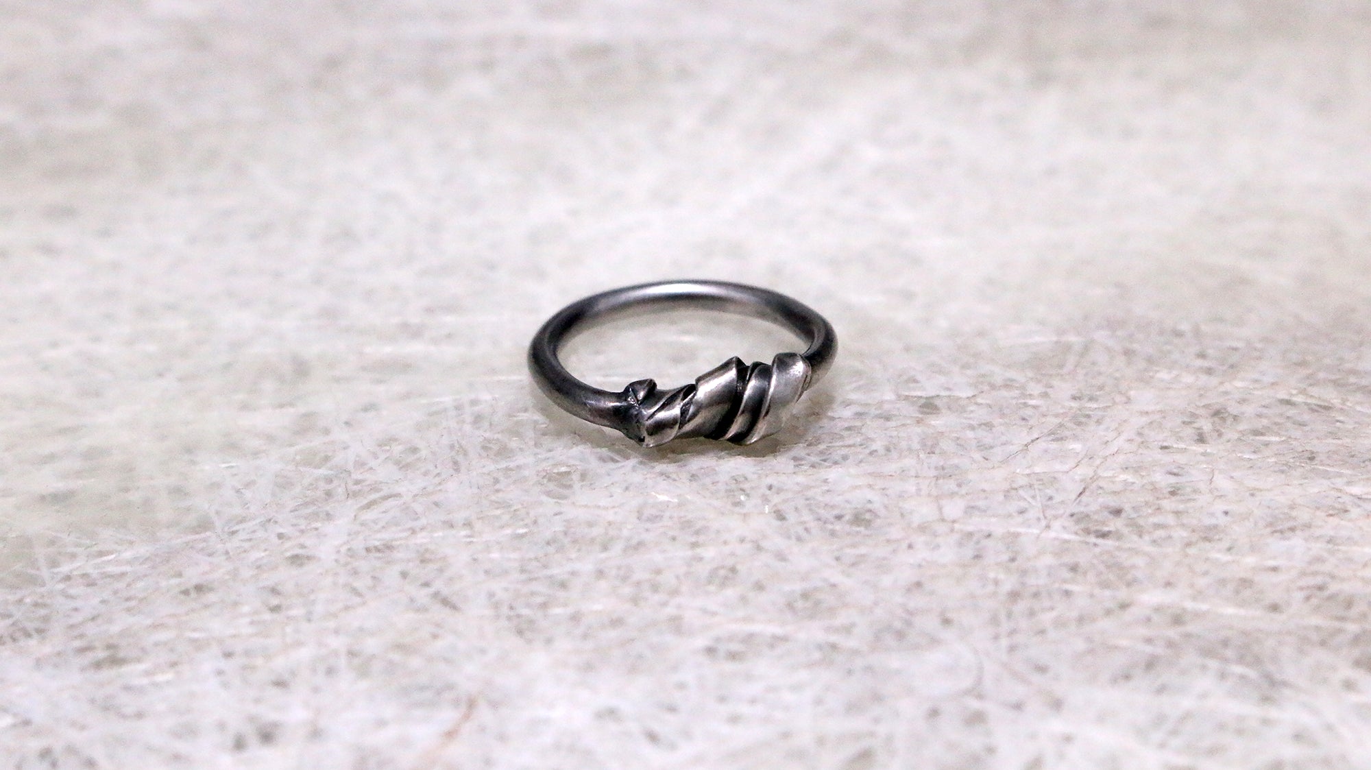 Deformed Coil Ring